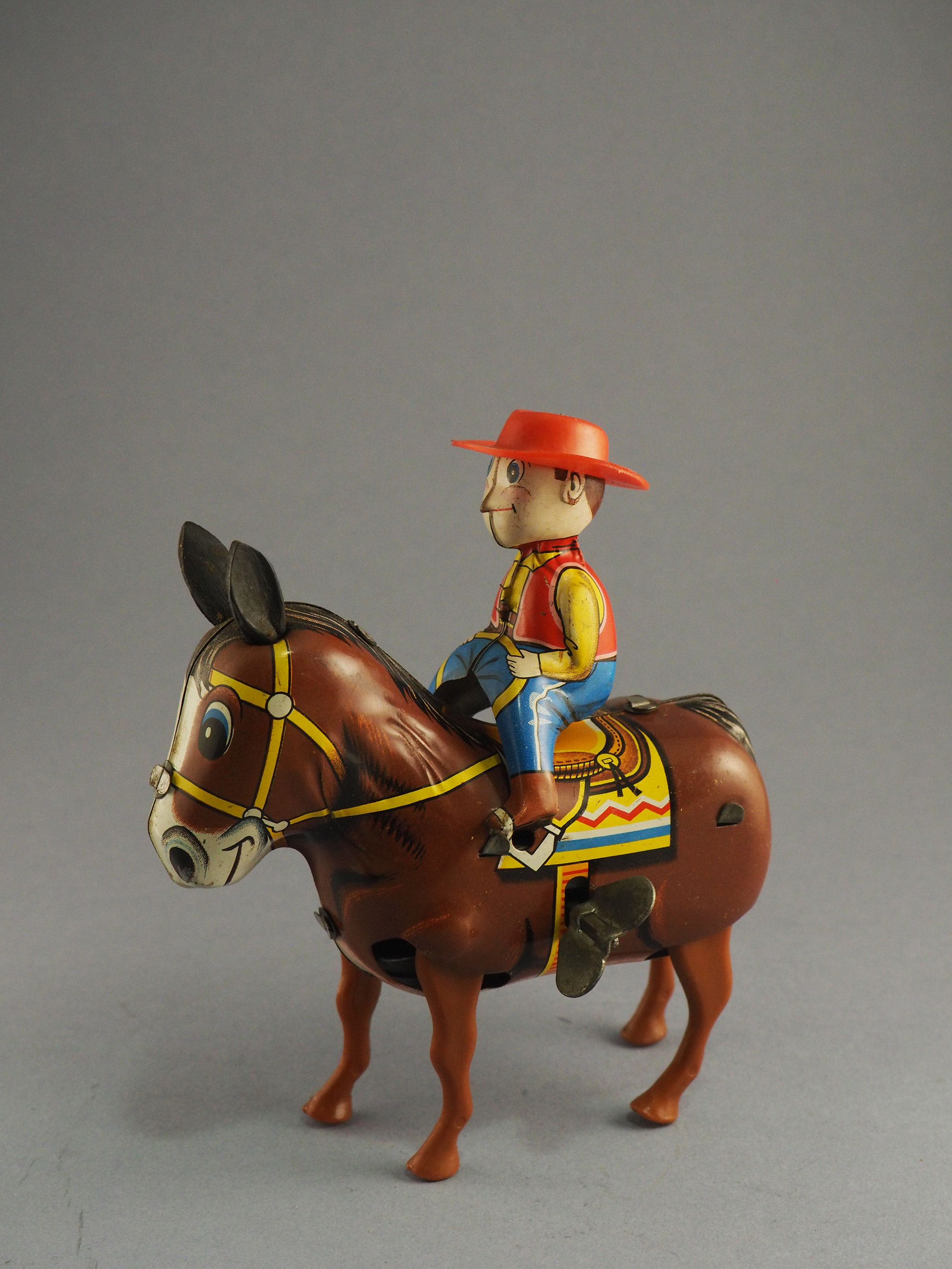 Plodding Donkey with Cowboy photo 1