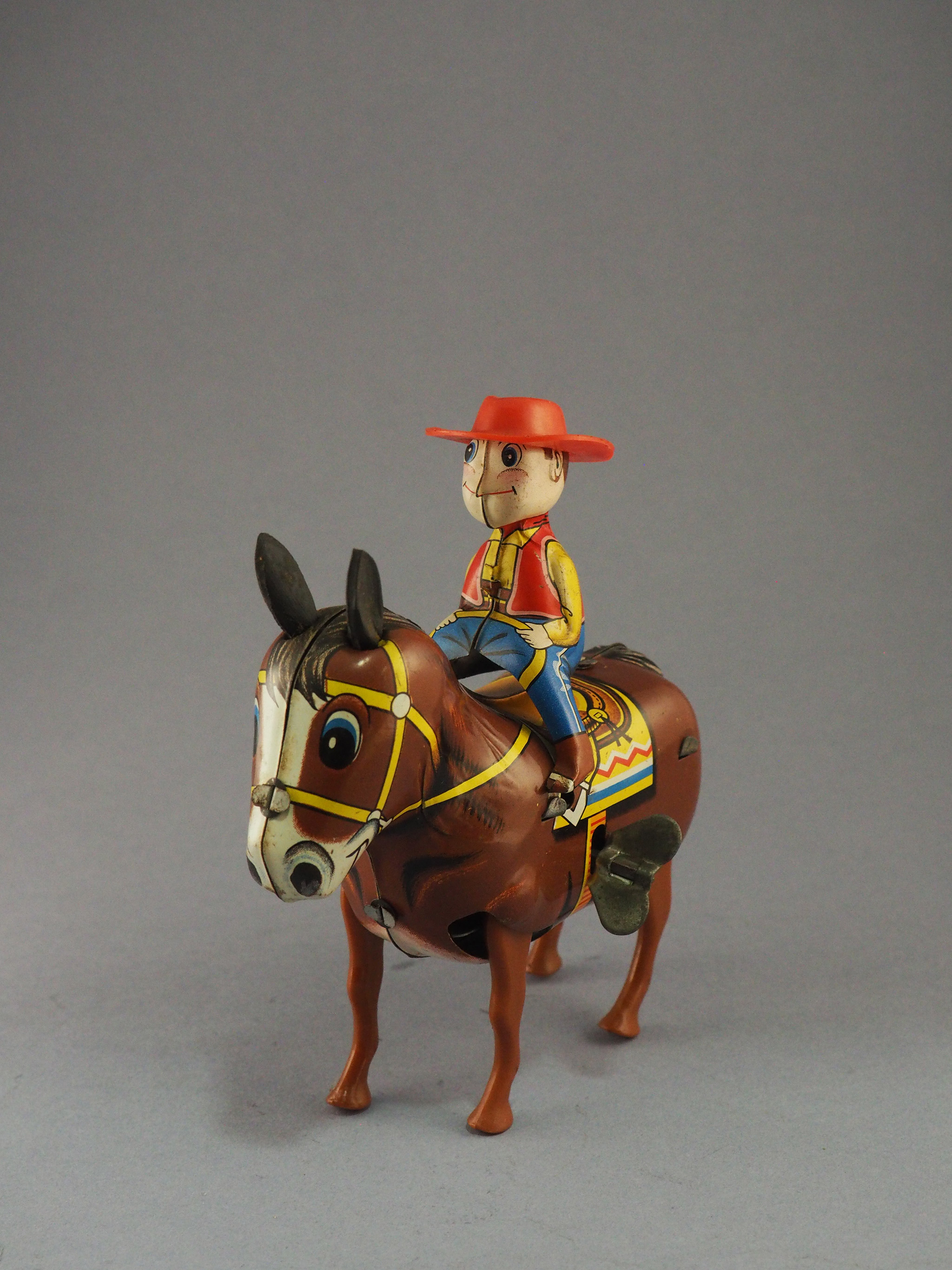 Plodding Donkey with Cowboy photo 2