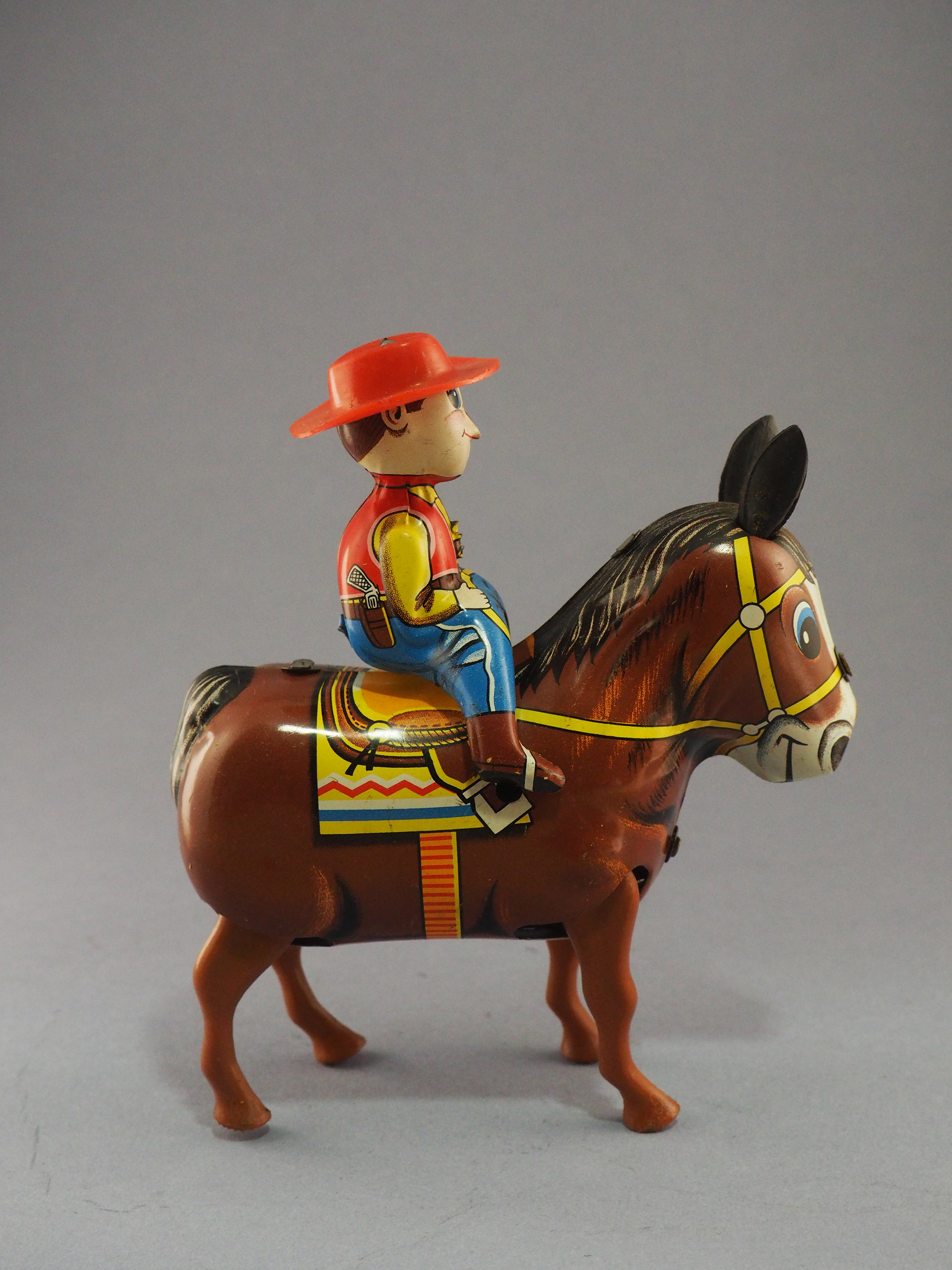 Plodding Donkey with Cowboy photo 3
