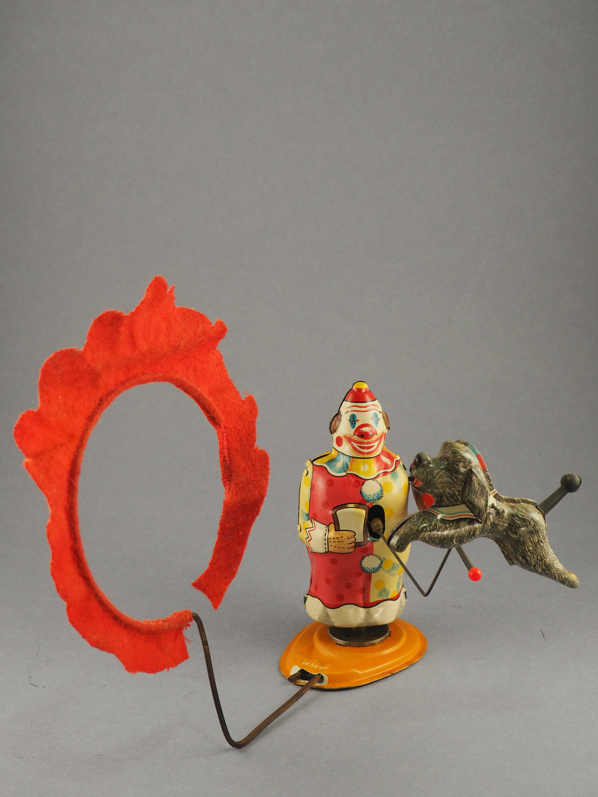 Clown Trainer and His Acrobatic Dog photo 1