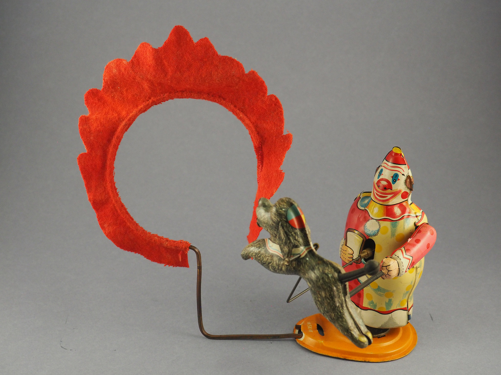 Clown Trainer and His Acrobatic Dog photo 2