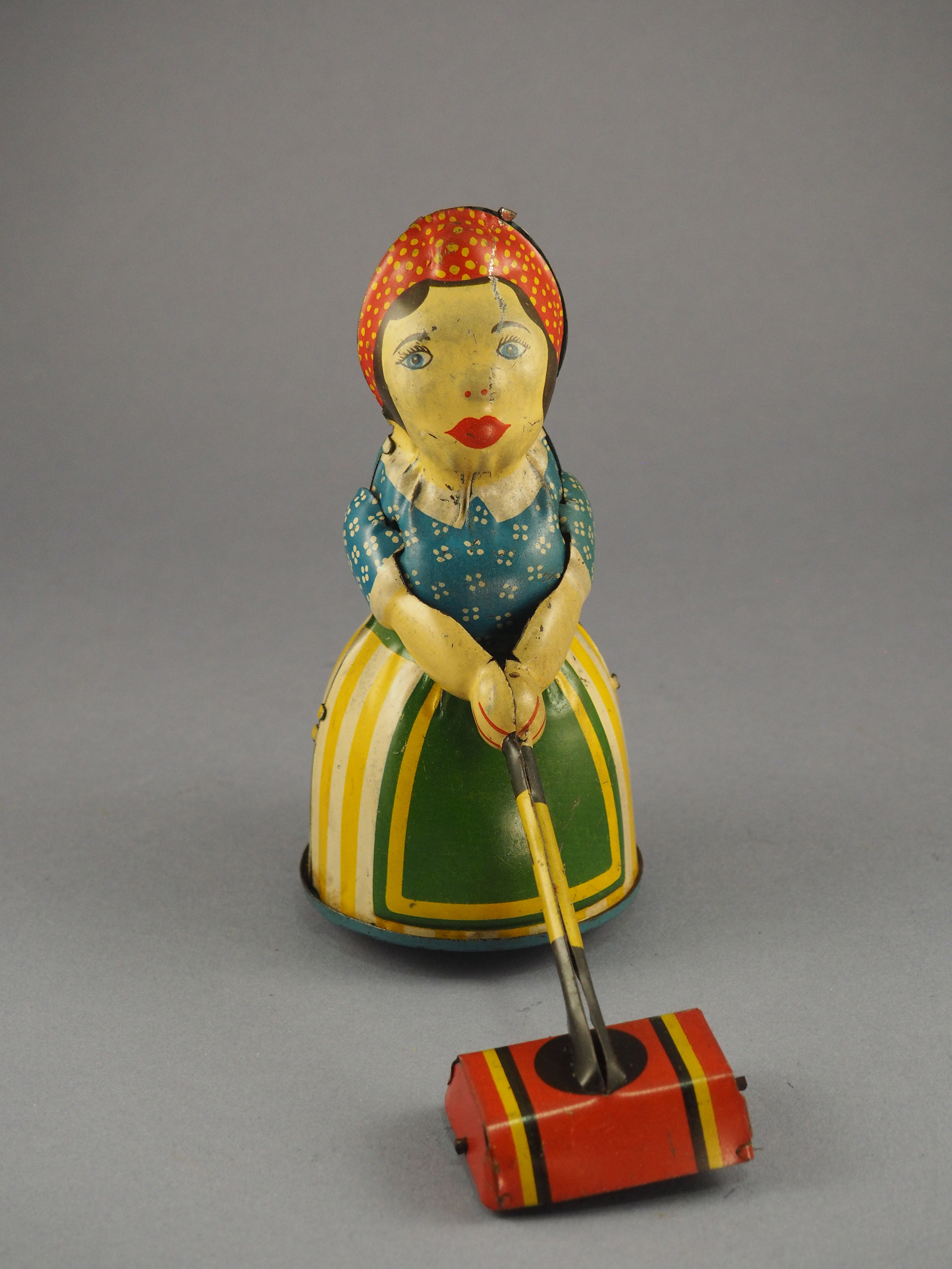 Lady with Sweeper photo 1